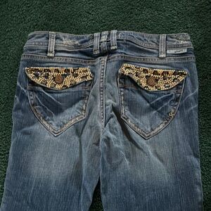 Blue Boot Cut Jeans with Decorative Back Pocket Design